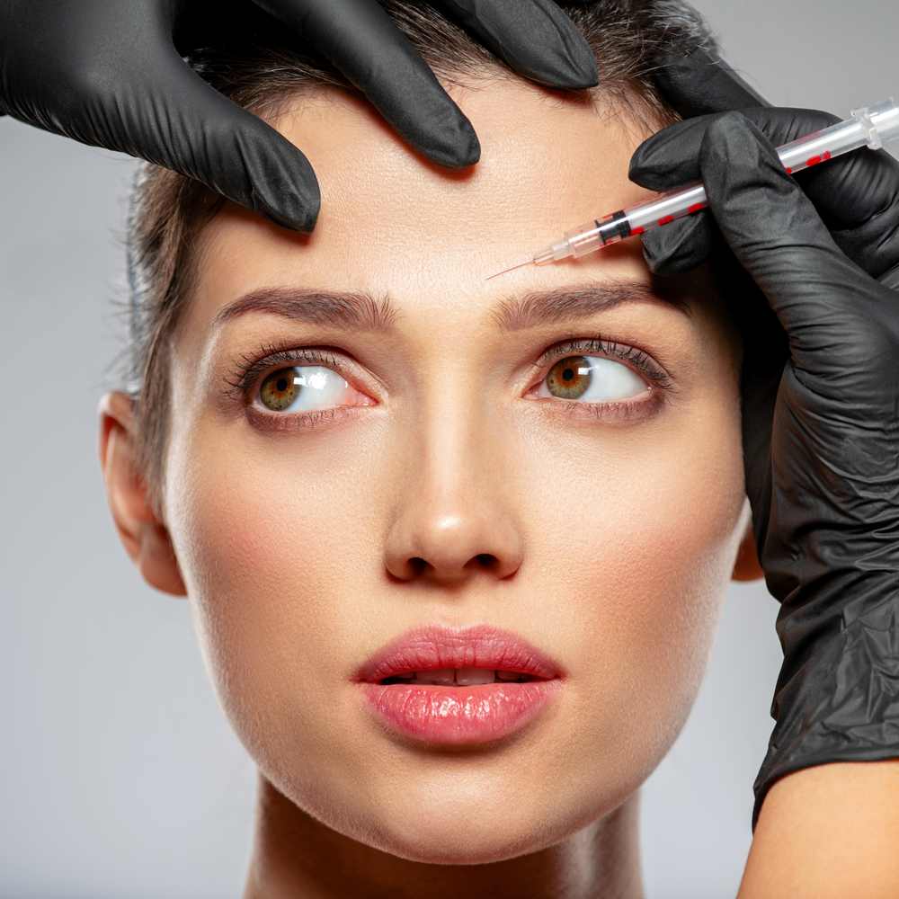 Clean, professional medical spa treatment room with neutral tones at Grand Cosmetic Clinic in Studio City